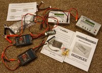Everything related to batteries & chargers (include 3 pairs of NIB 8mm bullets).jpg