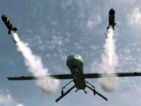 338-0529205326-predator-Drone-firing-missiles.jpg